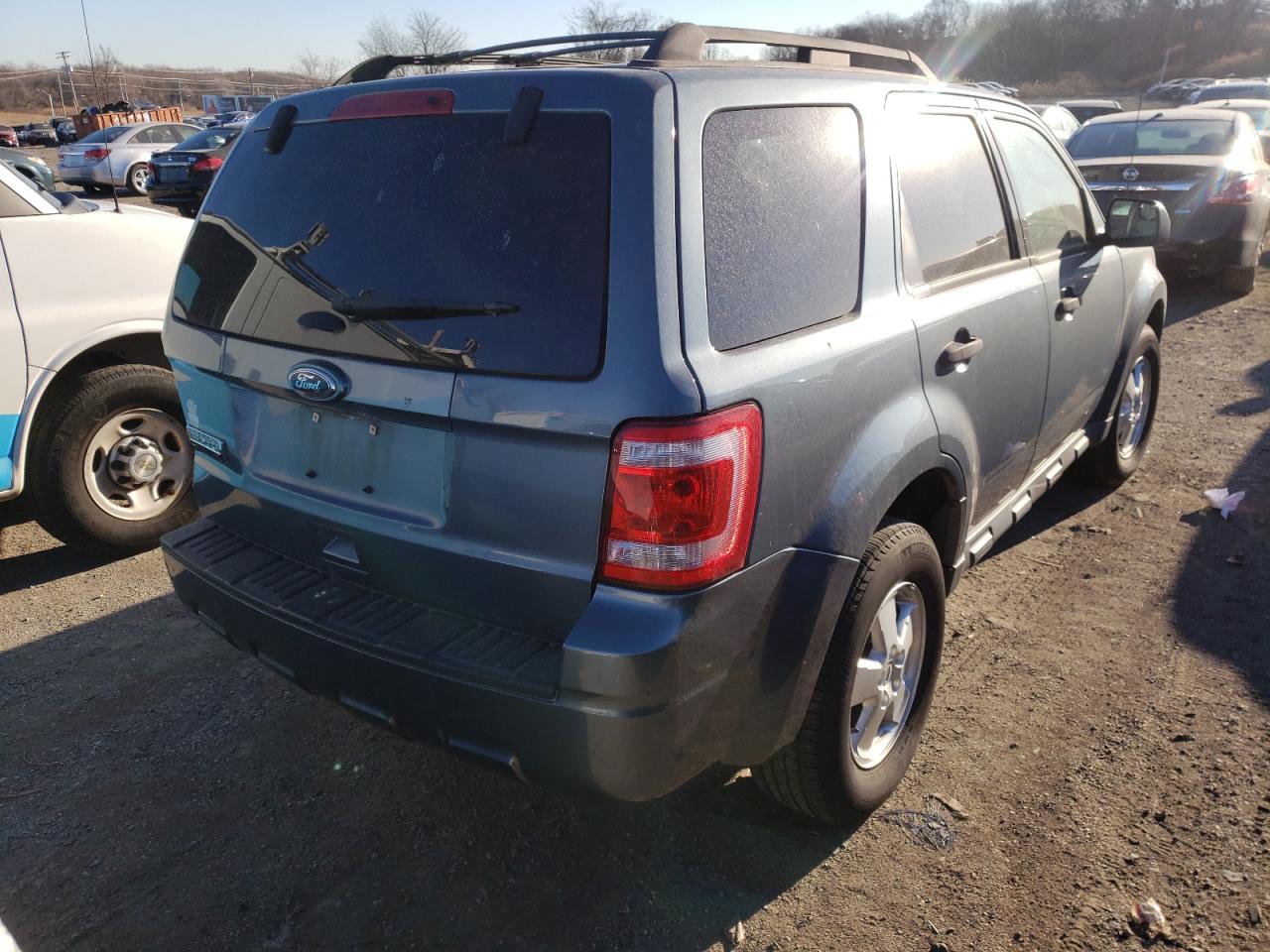 Photo 4 from auction – 2011 FORD ESCAPE XLT with VIN 1FMCU0D7XBKC48526