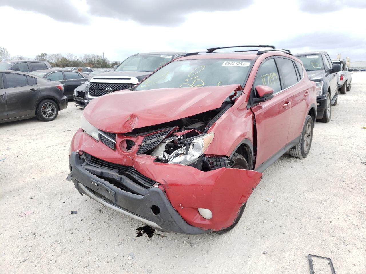 Photo 2 from auction – 2015 TOYOTA RAV4 XLE with VIN JTMWFREV0FJ035304