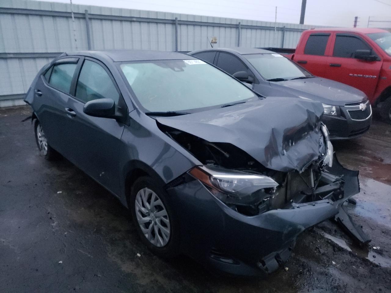 TOYOTA COROLLA L 2017 with VIN 5YFBURHE8HP661830 - Photo from auction
