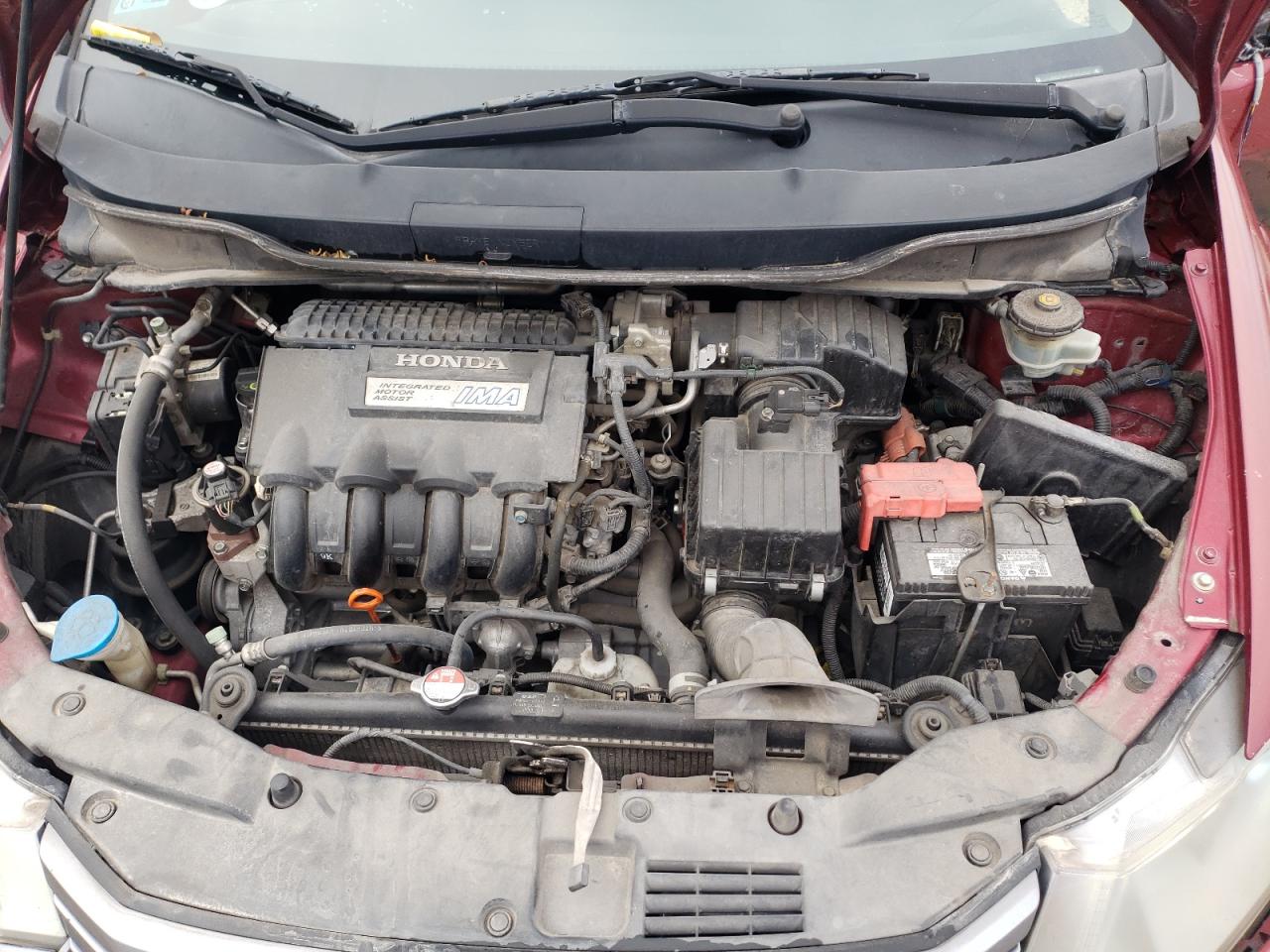 Photo 7 from auction – 2010 HONDA INSIGHT EX with VIN JHMZE2H77AS036746