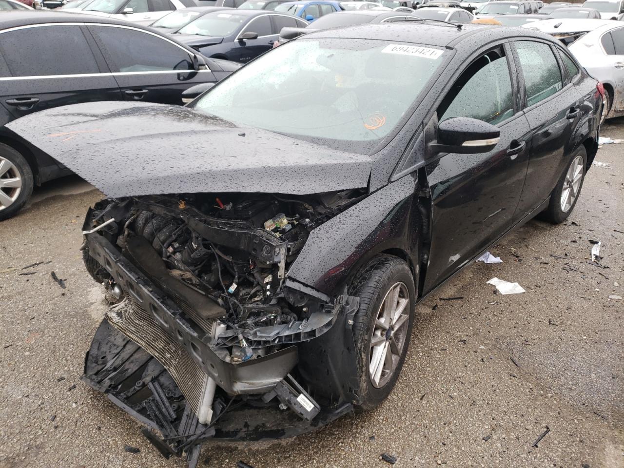 Photo 2 from auction – 2016 FORD FOCUS SE with VIN 1FADP3F2XGL336521