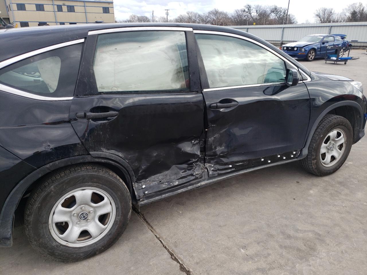 Photo 9 from auction – 2015 HONDA CR-V LX with VIN 5J6RM4H35FL076526