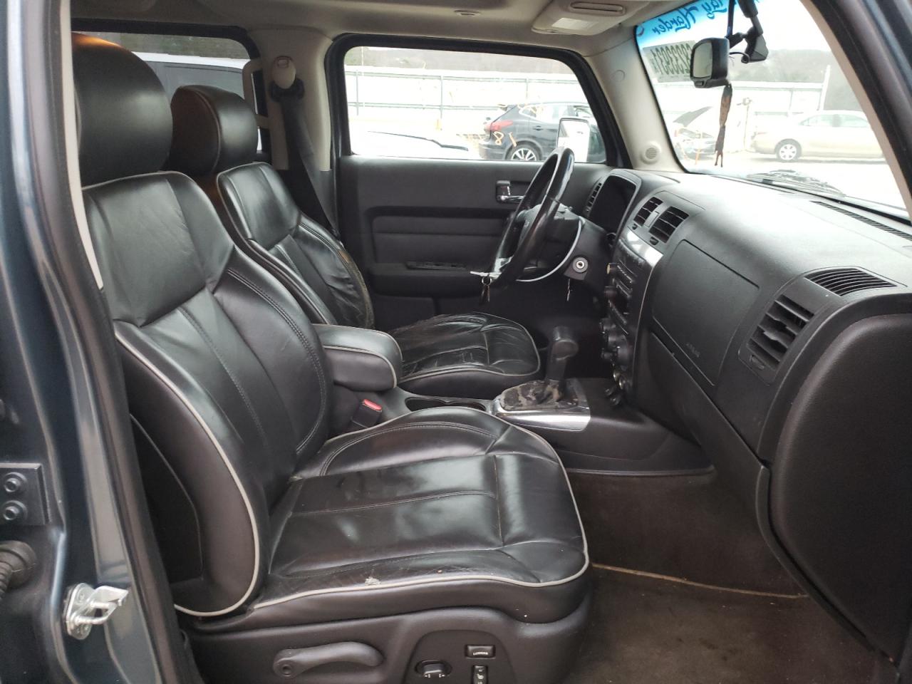 Photo 5 from auction – 2006 HUMMER H3 with VIN 5GTDN136468148230