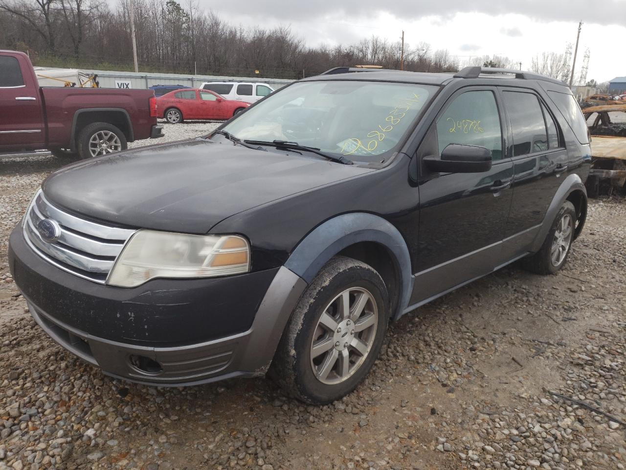Photo 2 from auction – 2009 FORD TAURUS X S with VIN 1FMDK02W39GA02614