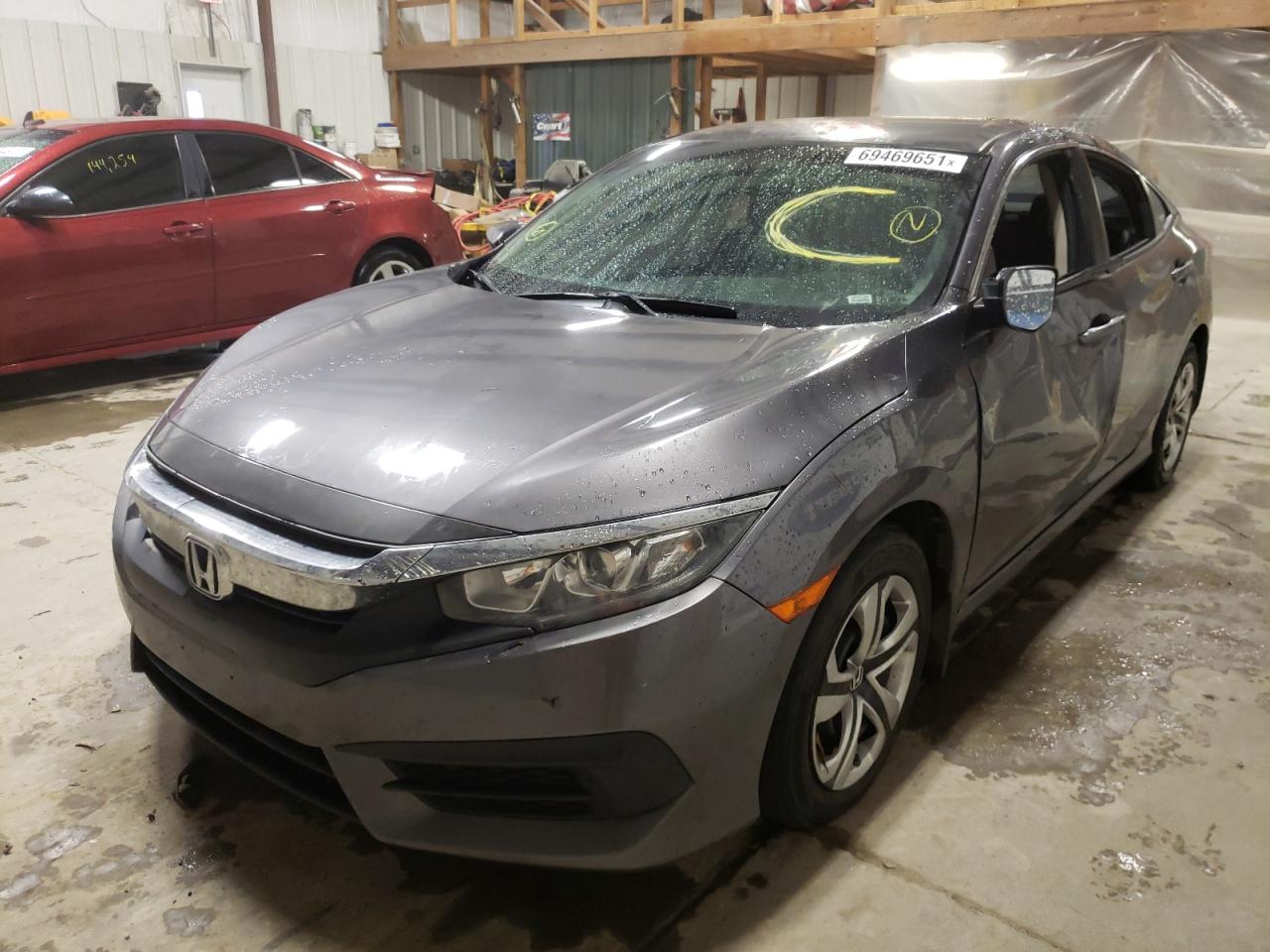 Photo 9 from auction – 2016 HONDA CIVIC LX with VIN 19XFC2F50GE087934