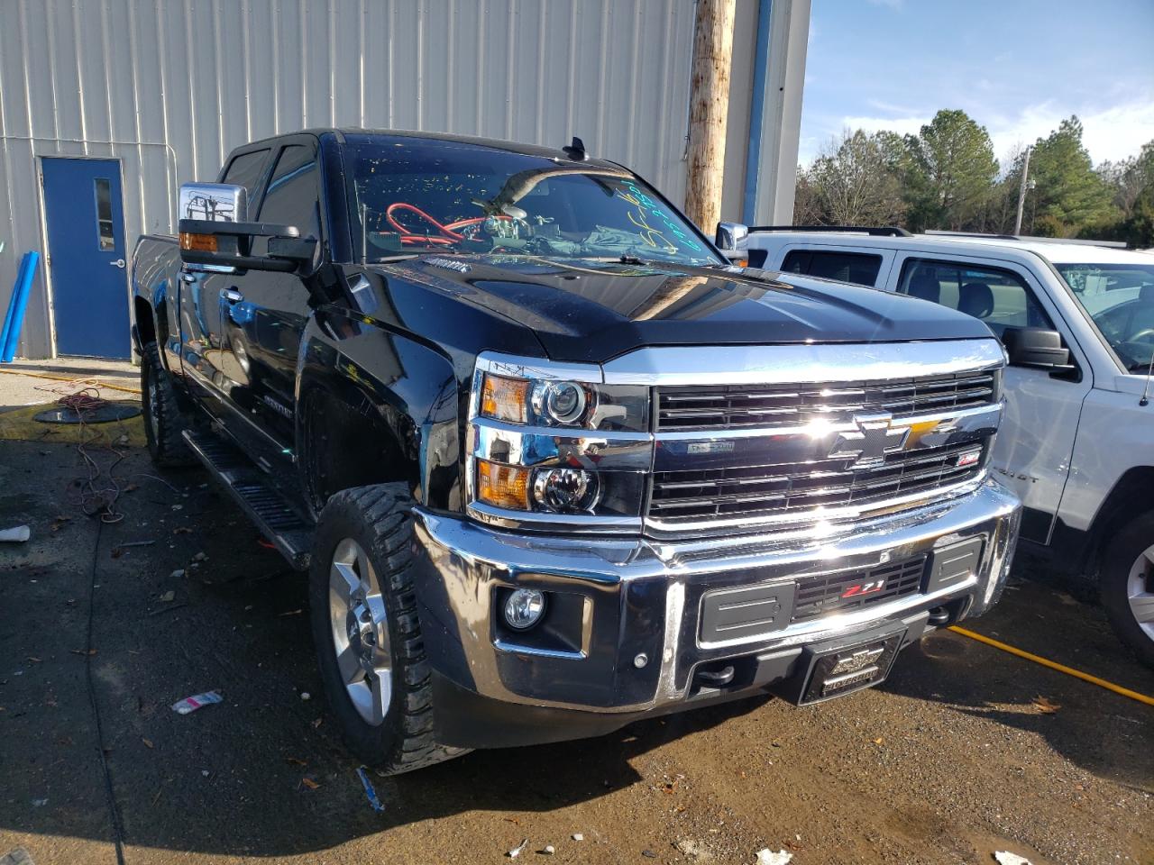 Photo 14 from auction – 2016 CHEVROLET SILVERADO with VIN 1GC1KWE80GF253620