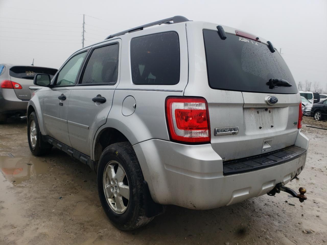 Photo 3 from auction – 2010 FORD ESCAPE XLT with VIN 1FMCU0DG8AKD32083