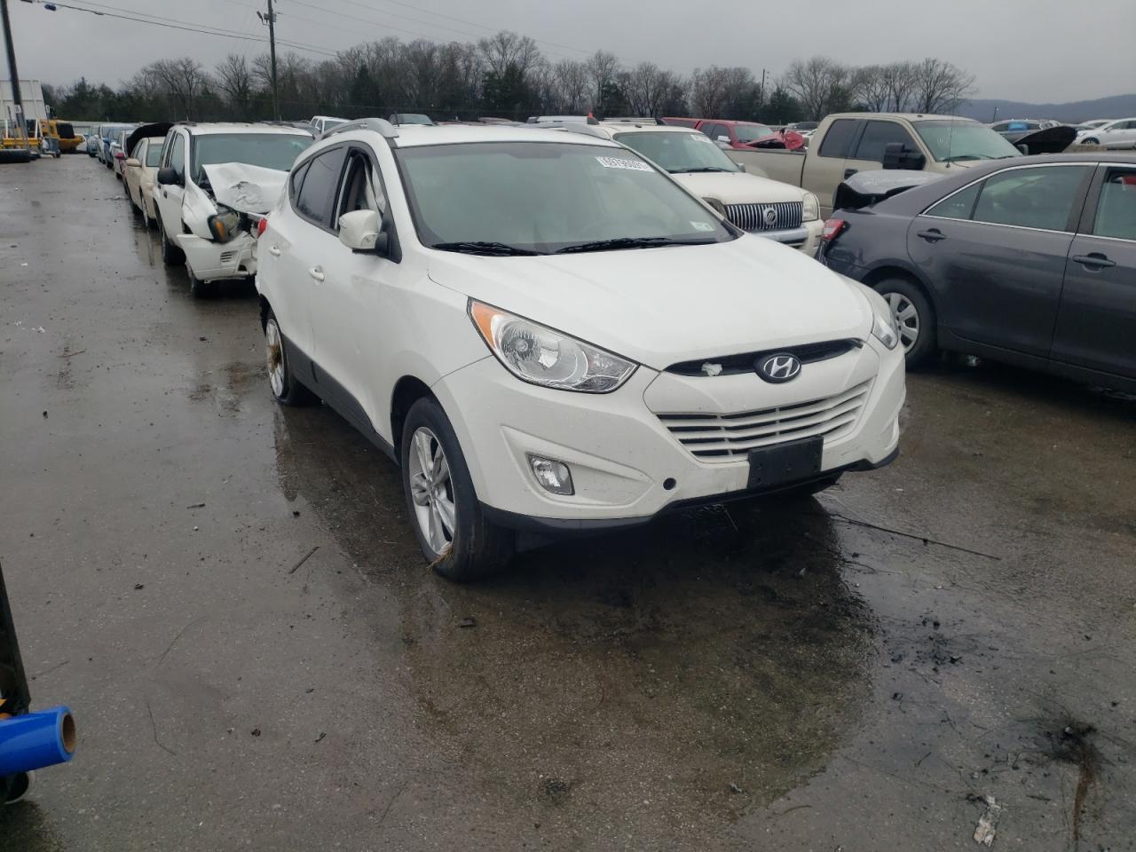 HYUNDAI TUCSON GLS 2013 with VIN KM8JUCAC6DU710310 - Photo from auction
