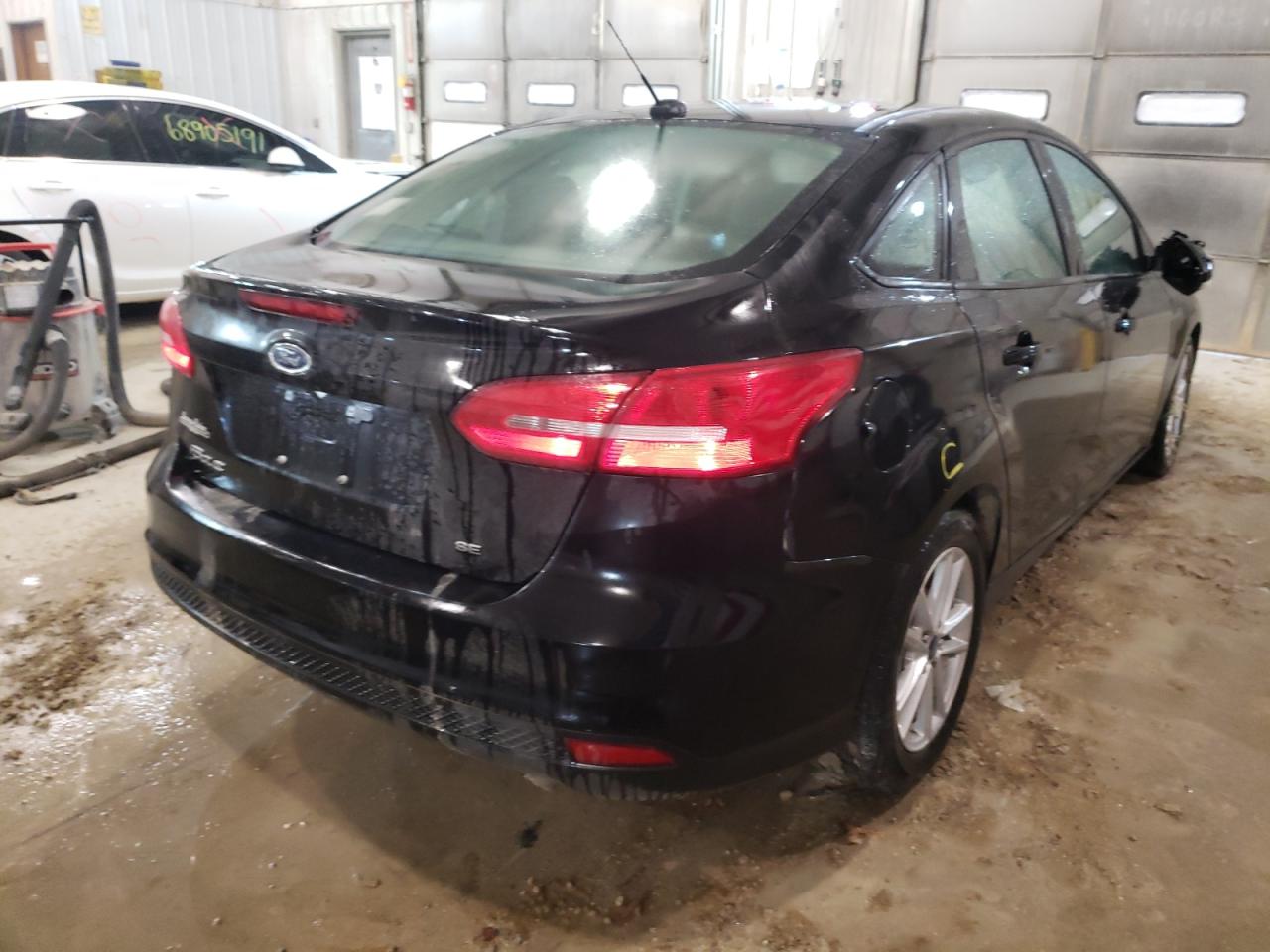 Photo 4 from auction – 2017 FORD FOCUS SE with VIN 1FADP3F26HL342804