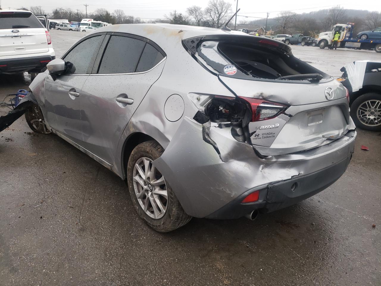 Photo 3 from auction – 2014 MAZDA 3 TOURING with VIN JM1BM1L79E1100577