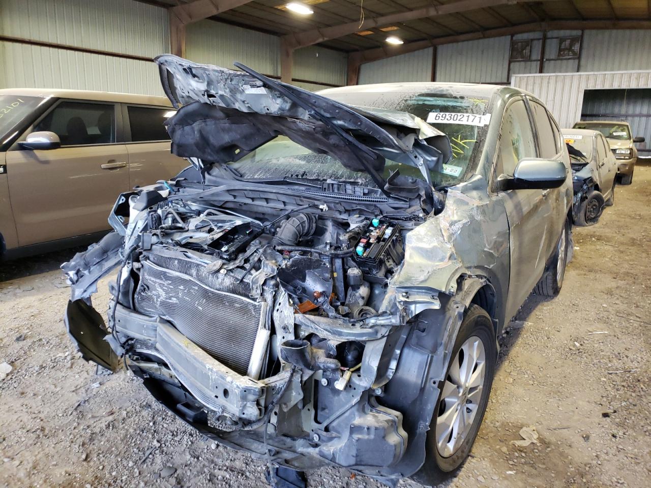 Photo 2 from auction – 2012 HONDA CR-V EX with VIN 5J6RM3H56CL010834