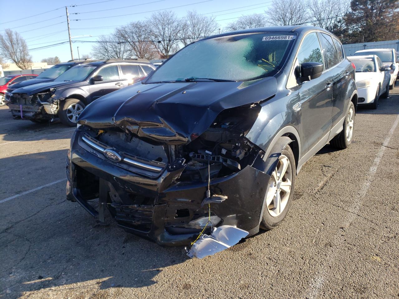 Photo 2 from auction – 2016 FORD ESCAPE SE with VIN 1FMCU0GX1GUC08505