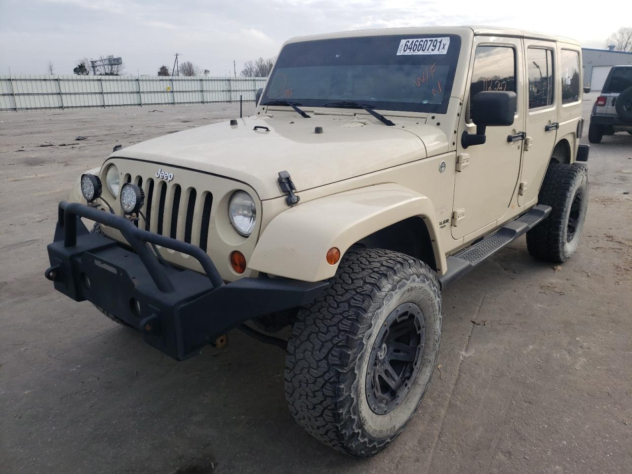 Photo 2 from auction – 2011 JEEP WRANGLER U with VIN 1J4BA5H17BL561890