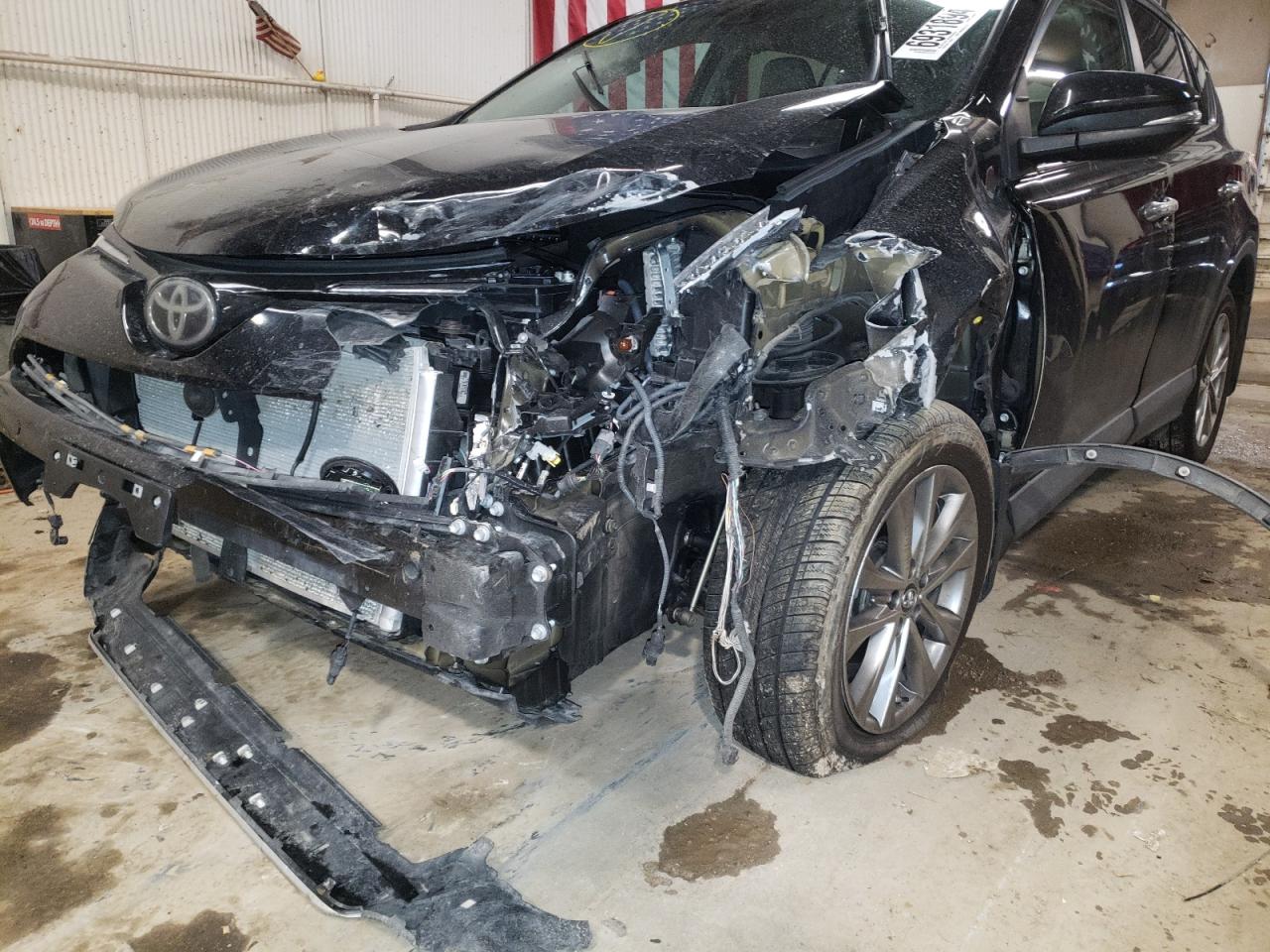 Photo 9 from auction – 2016 TOYOTA RAV4 LIMIT with VIN 2T3DFREV9GW496141