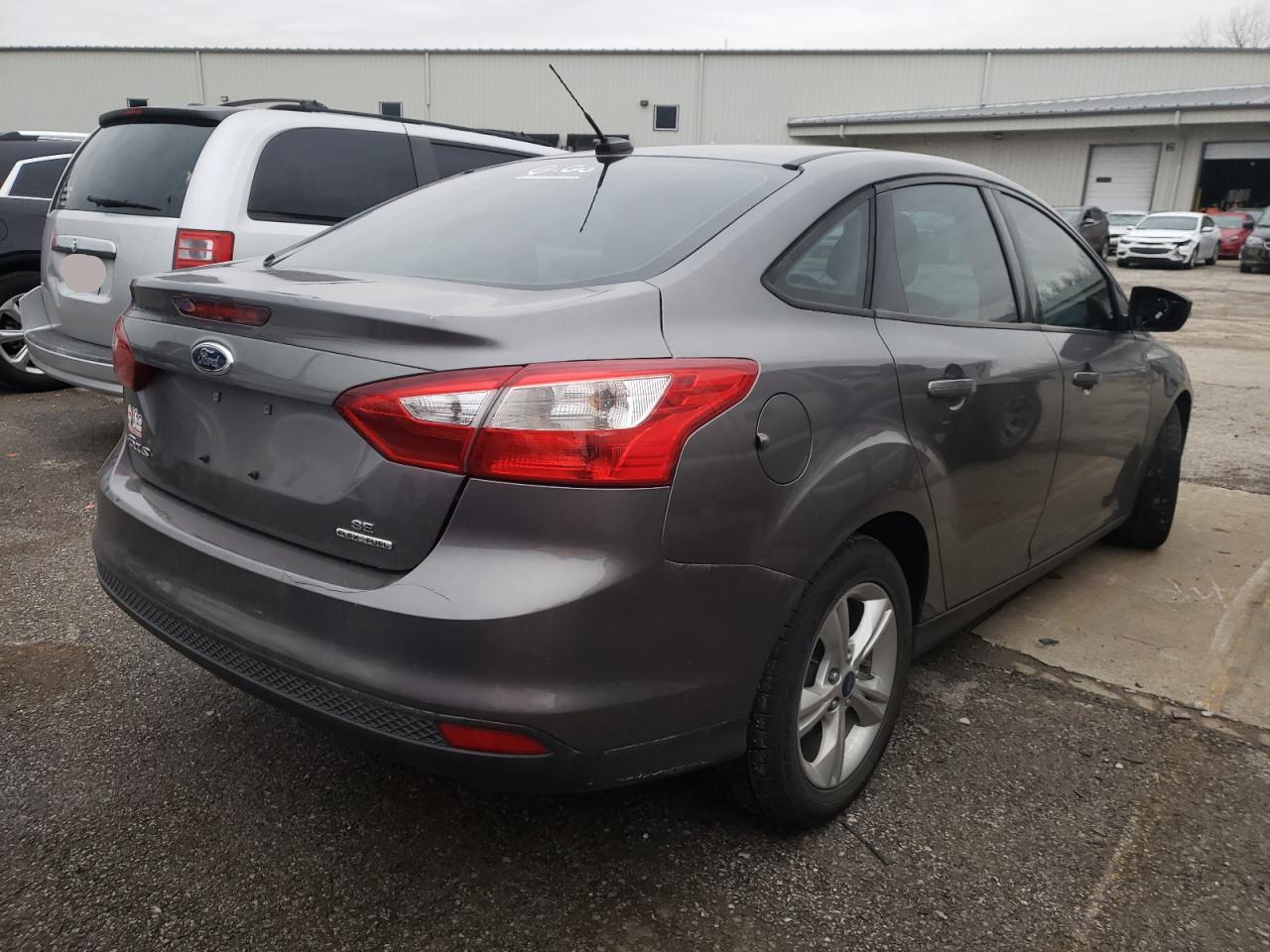 Foto 4 de la subasta – 2013 FORD FOCUS SE con VIN 1FADP3F23DL380372