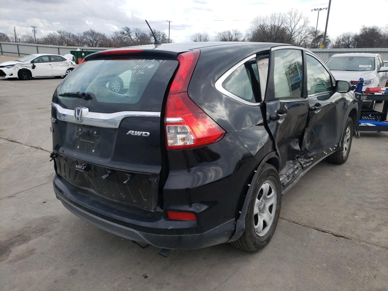 Photo 4 from auction – 2015 HONDA CR-V LX with VIN 5J6RM4H35FL076526