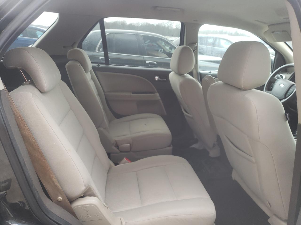 Photo 6 from auction – 2009 FORD TAURUS X S with VIN 1FMDK02W39GA02614