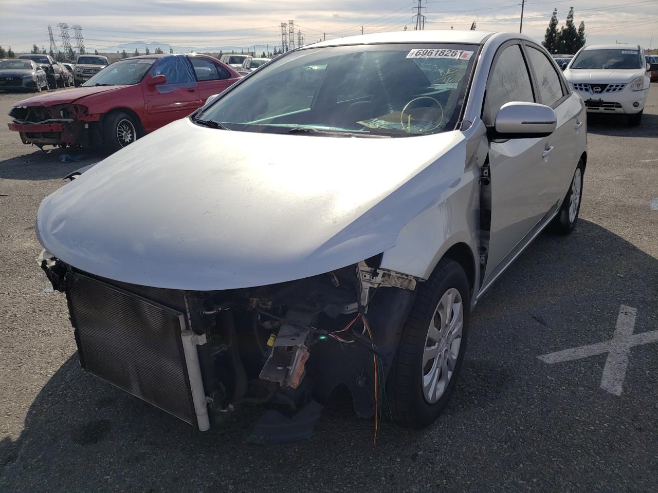 Photo 2 from auction – 2011 KIA FORTE EX with VIN KNAFU4A29B5449248