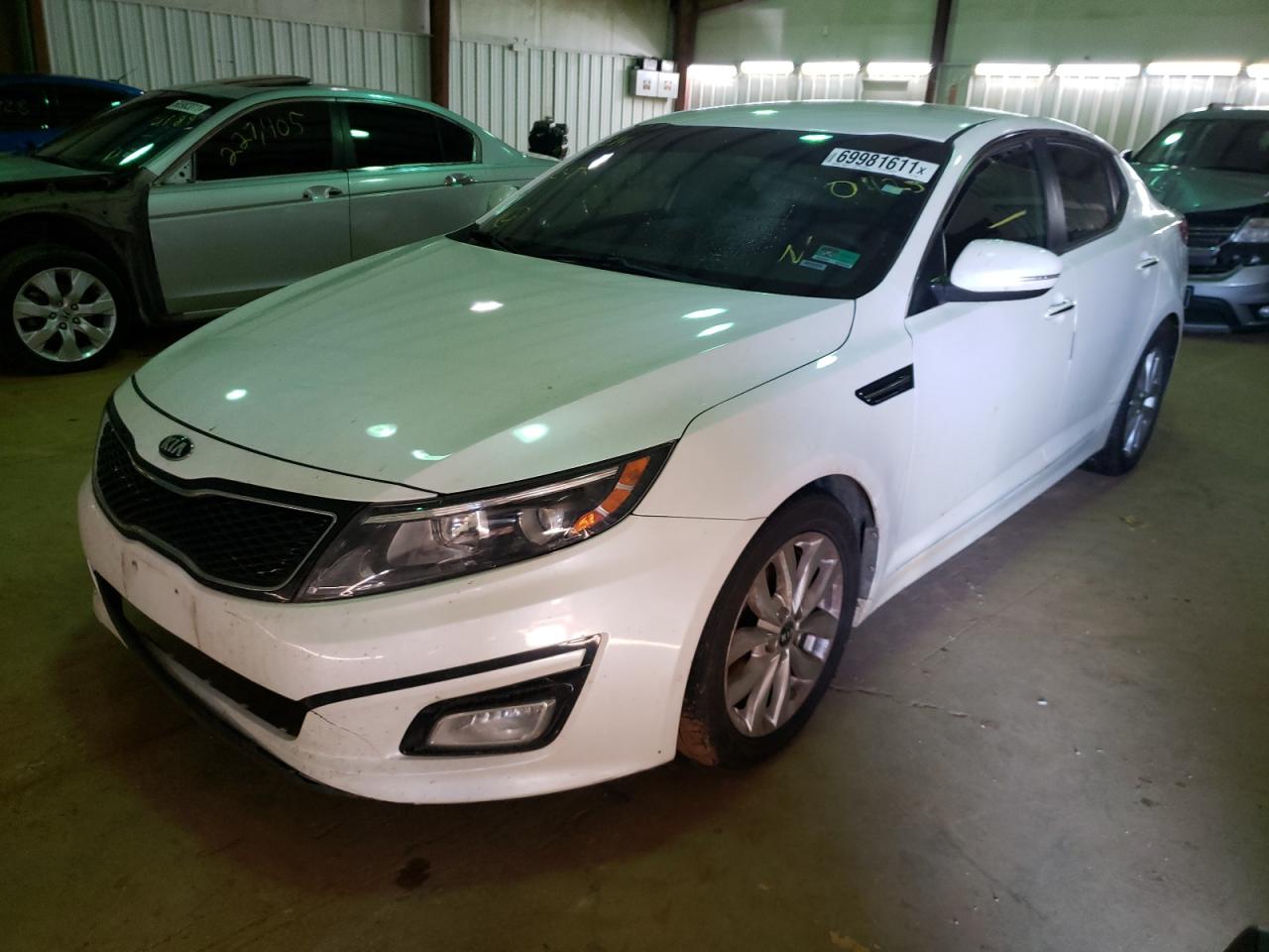 Photo 2 from auction – 2015 KIA OPTIMA LX with VIN KNAGM4A74F5630425