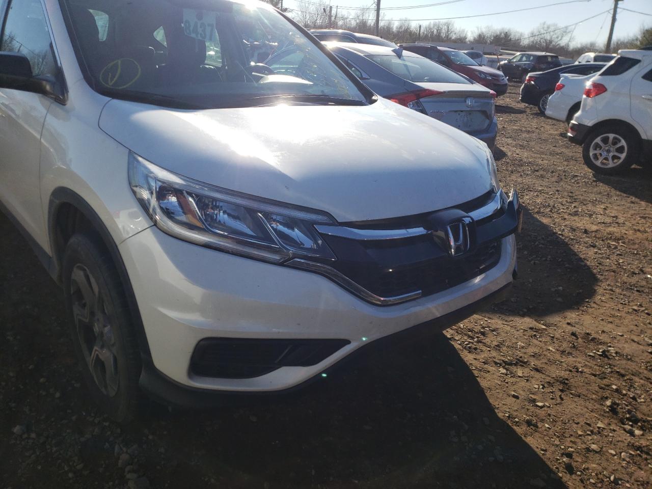 Photo 9 from auction – 2016 HONDA CR-V LX with VIN 5J6RM4H37GL113609