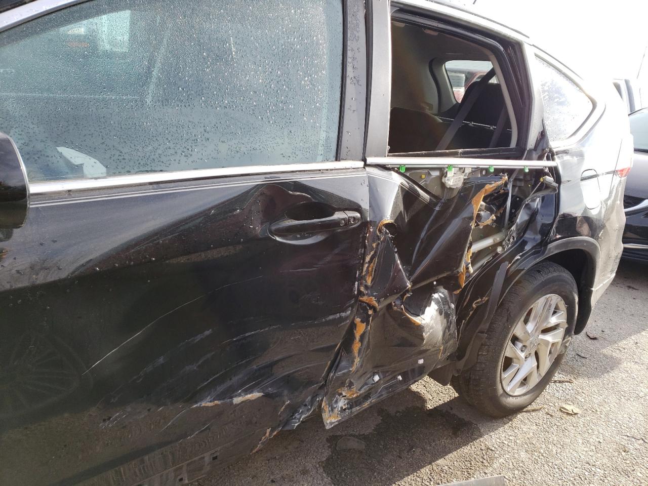Photo 10 from auction – 2015 HONDA CR-V EX with VIN 5J6RM3H50FL012969