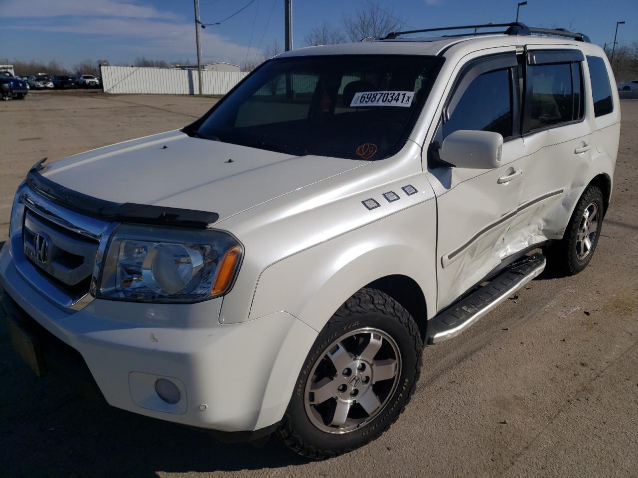 Photo 9 from auction – 2011 HONDA PILOT TOUR with VIN 5FNYF4H9XBB027111