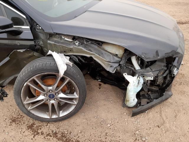 Photo 9 from auction – 2014 FORD FUSION TIT with VIN 3FA6P0K90ER168204