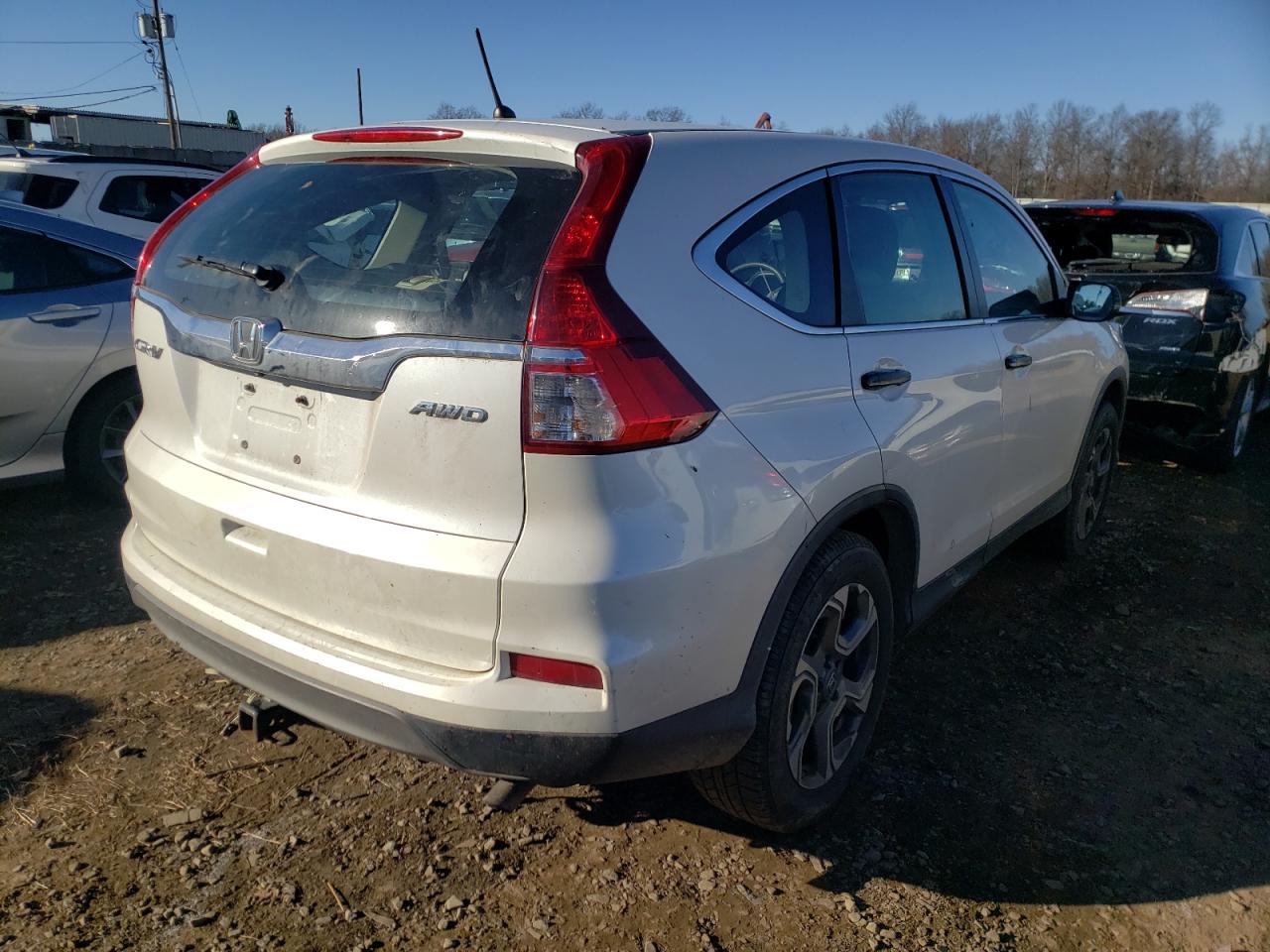 Photo 4 from auction – 2016 HONDA CR-V LX with VIN 5J6RM4H37GL113609