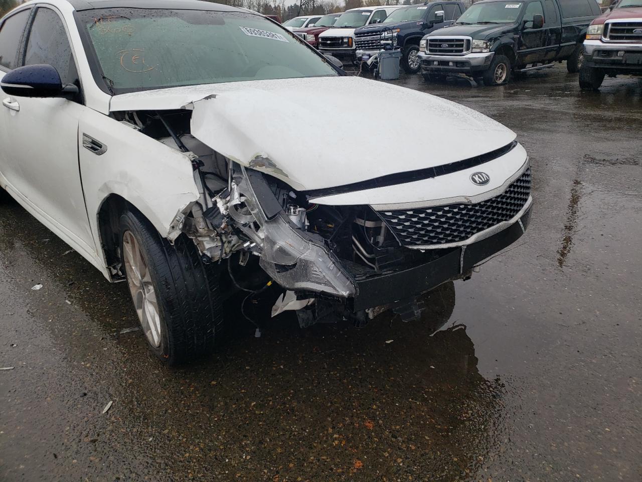 Photo 9 from auction – 2016 KIA OPTIMA EX with VIN 5XXGU4L31GG102948