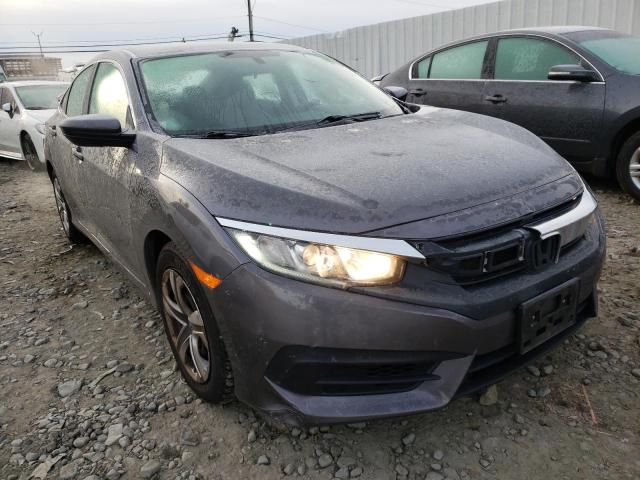 HONDA CIVIC LX 2018 with VIN 2HGFC2F50JH580106 - Photo from auction