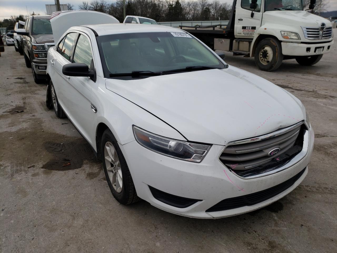 FORD TAURUS SE 2014 with VIN 1FAHP2D81EG161679 - Photo from auction