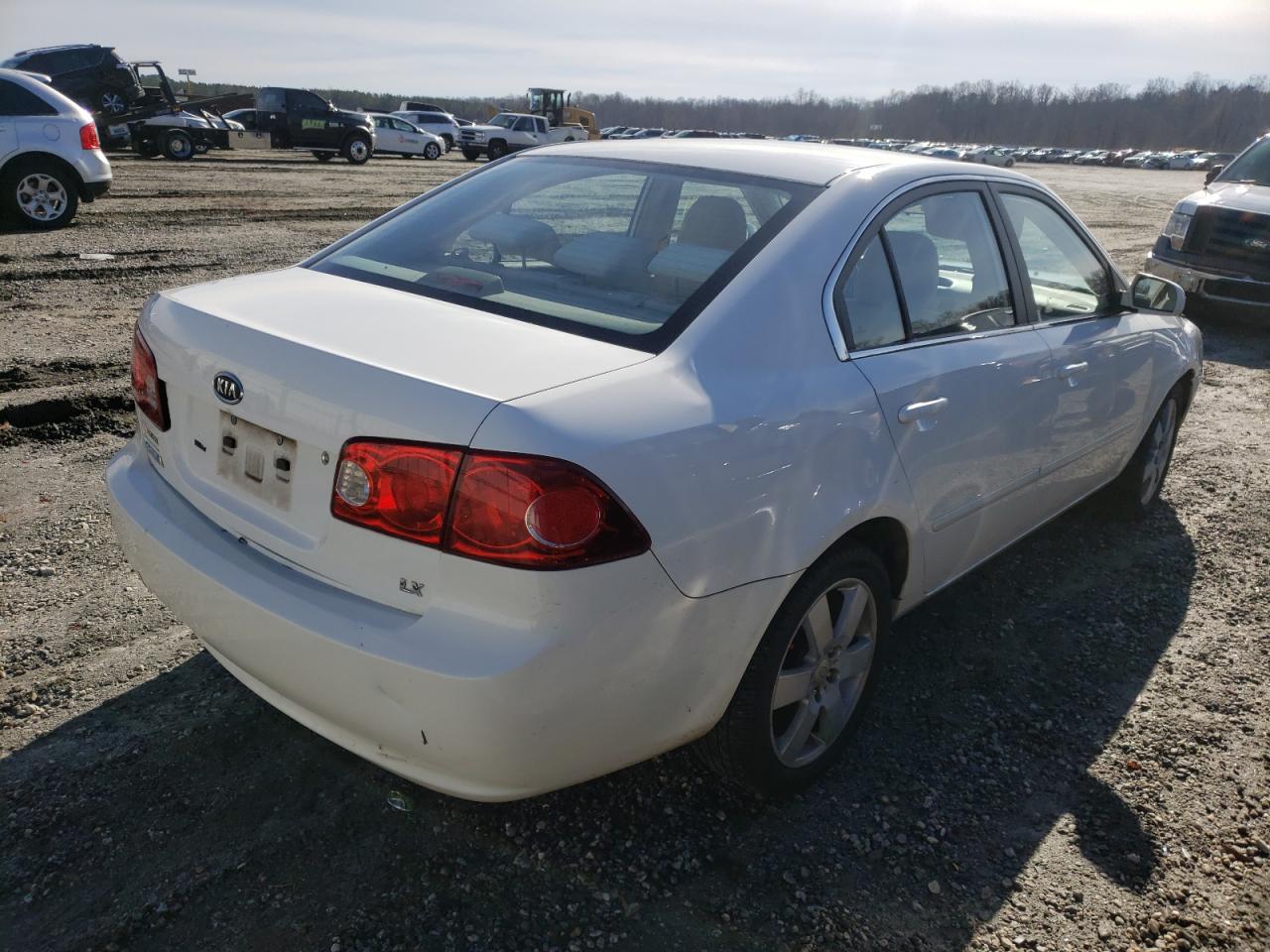Photo 4 from auction – 2006 KIA OPTIMA LX with VIN KNAGE123165079149