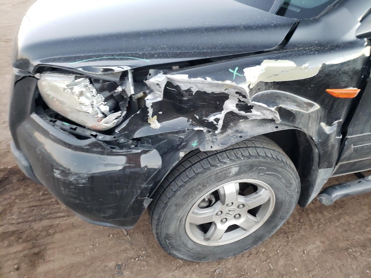 Photo 9 from auction – 2007 HONDA PILOT EX with VIN 2HKYF18497H521987
