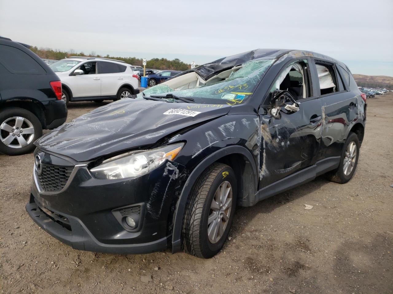 Photo 2 from auction – 2015 MAZDA CX-5 TOURI with VIN JM3KE4CY2F0465673