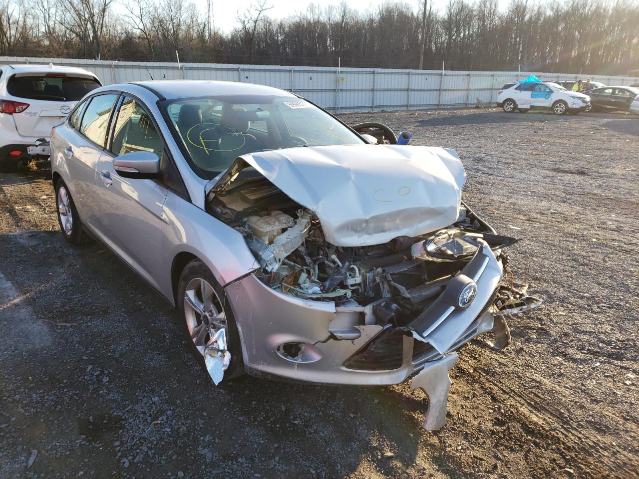 FORD FOCUS SE 2014 with VIN 1FADP3F23EL320318 - Photo from auction