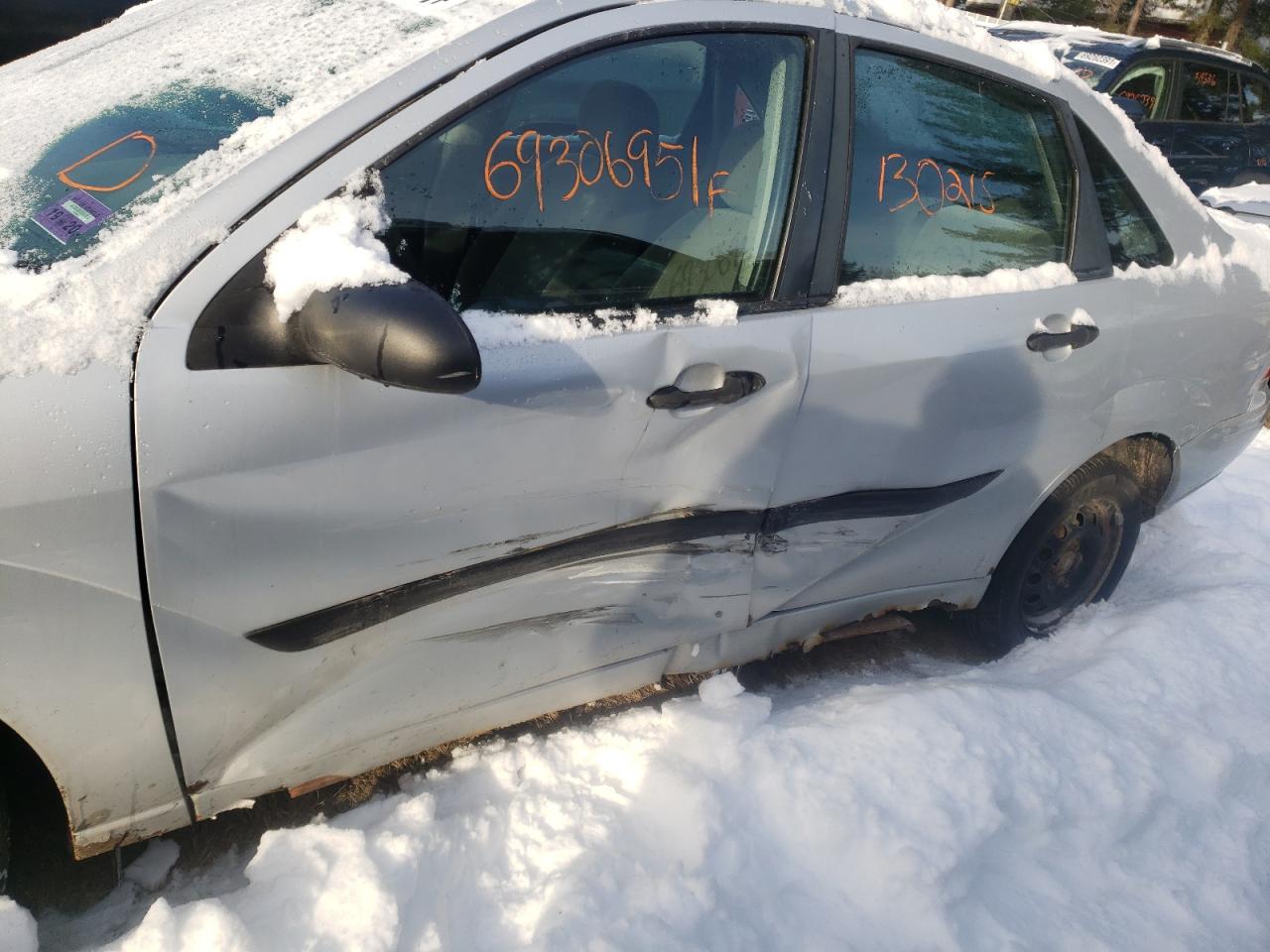Photo 9 from auction – 2002 FORD FOCUS LX with VIN 1FAFP33P62W240045