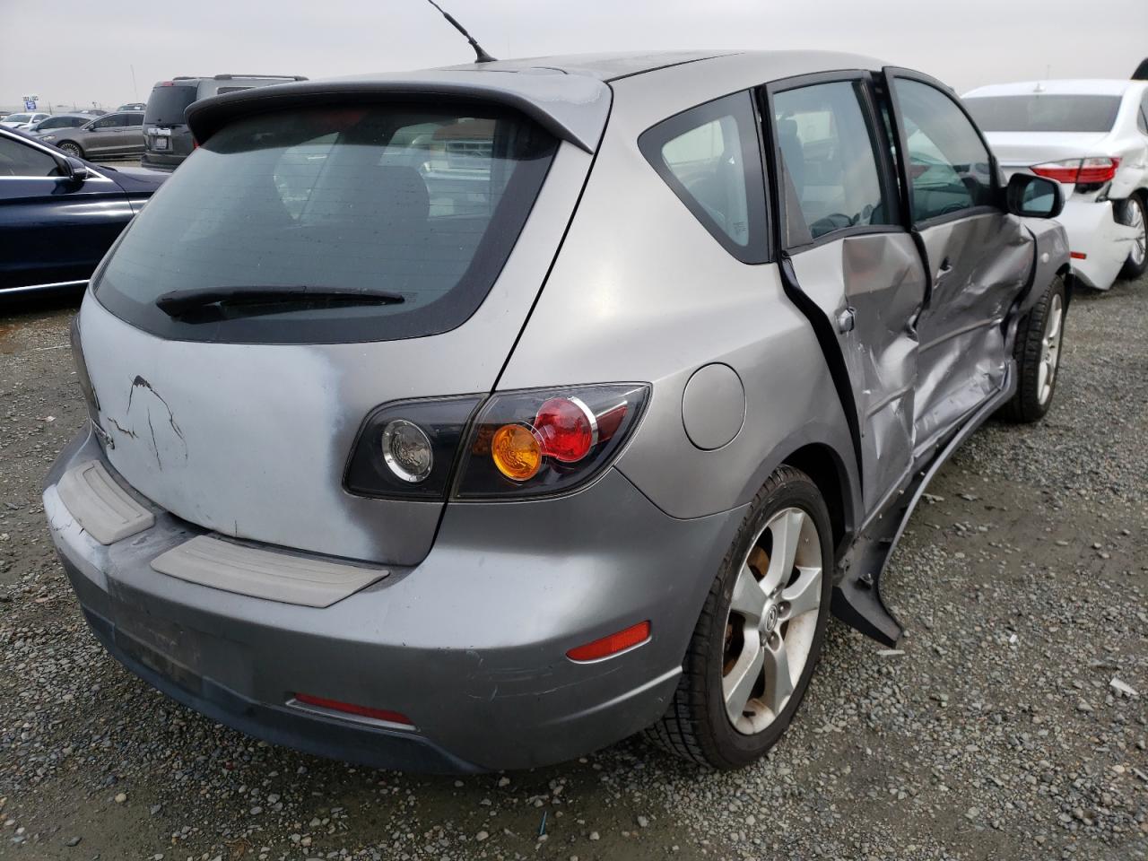 Photo 4 from auction – 2005 MAZDA 3 HATCHBAC with VIN JM1BK143351299868