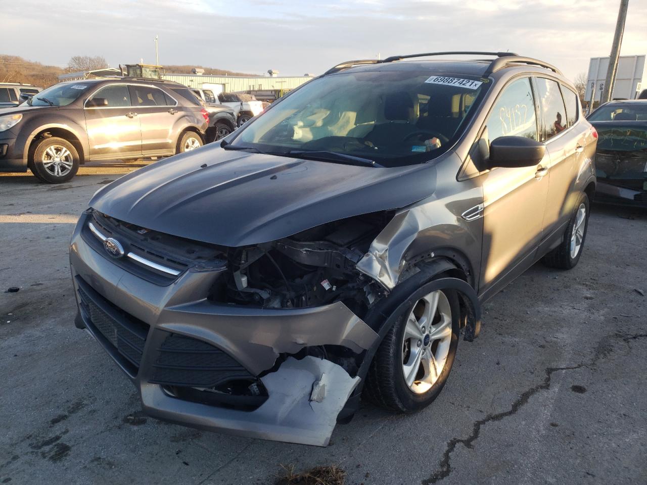 Photo 2 from auction – 2014 FORD ESCAPE SE with VIN 1FMCU9G98EUC38927
