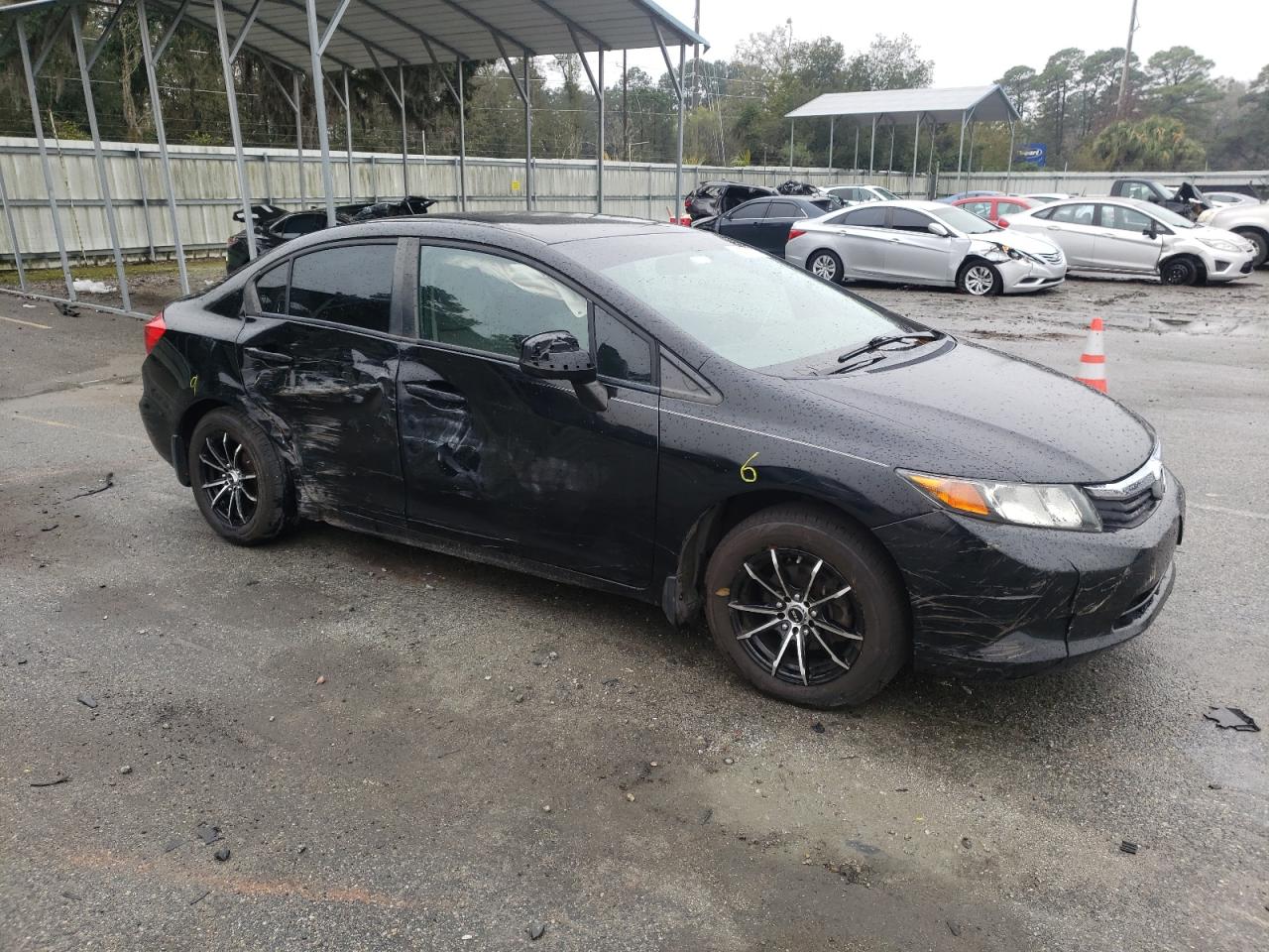 Photo 9 from auction – 2012 HONDA CIVIC LX with VIN 19XFB2F58CE011729