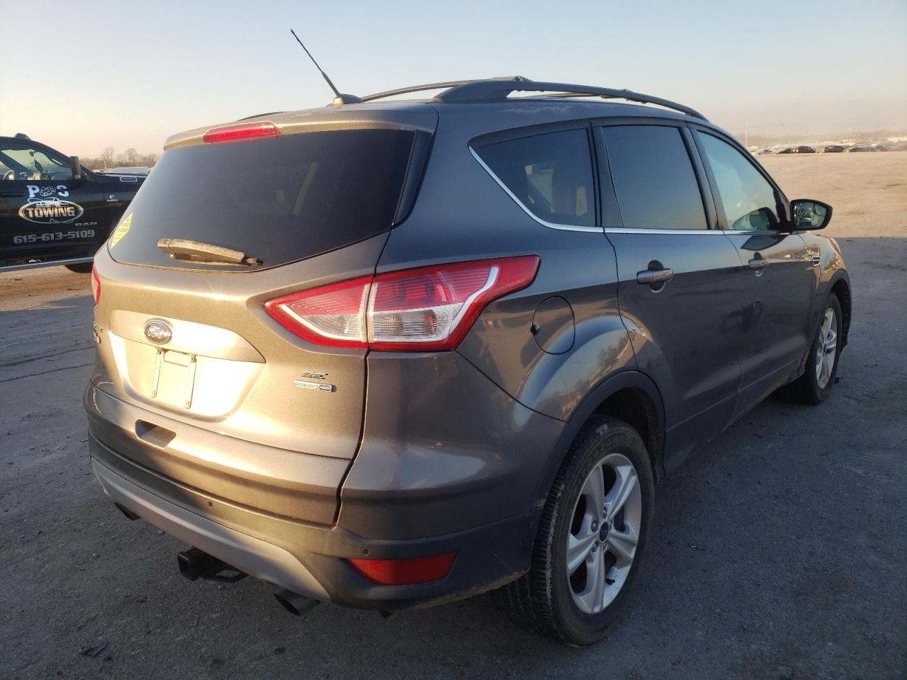 Photo 4 from auction – 2014 FORD ESCAPE SE with VIN 1FMCU9G98EUC38927