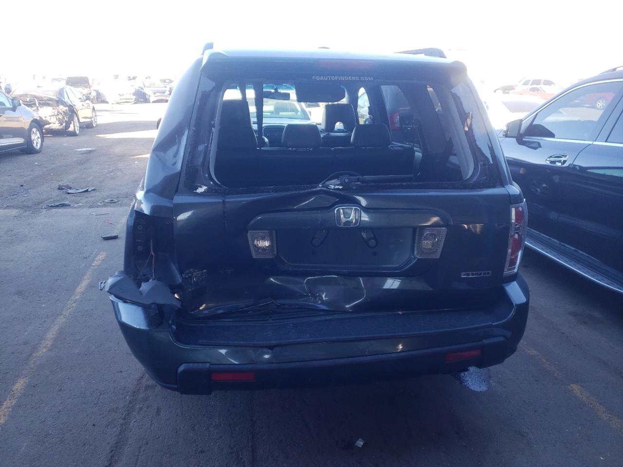 Photo 9 from auction – 2006 HONDA PILOT EX with VIN 2HKYF18536H516596
