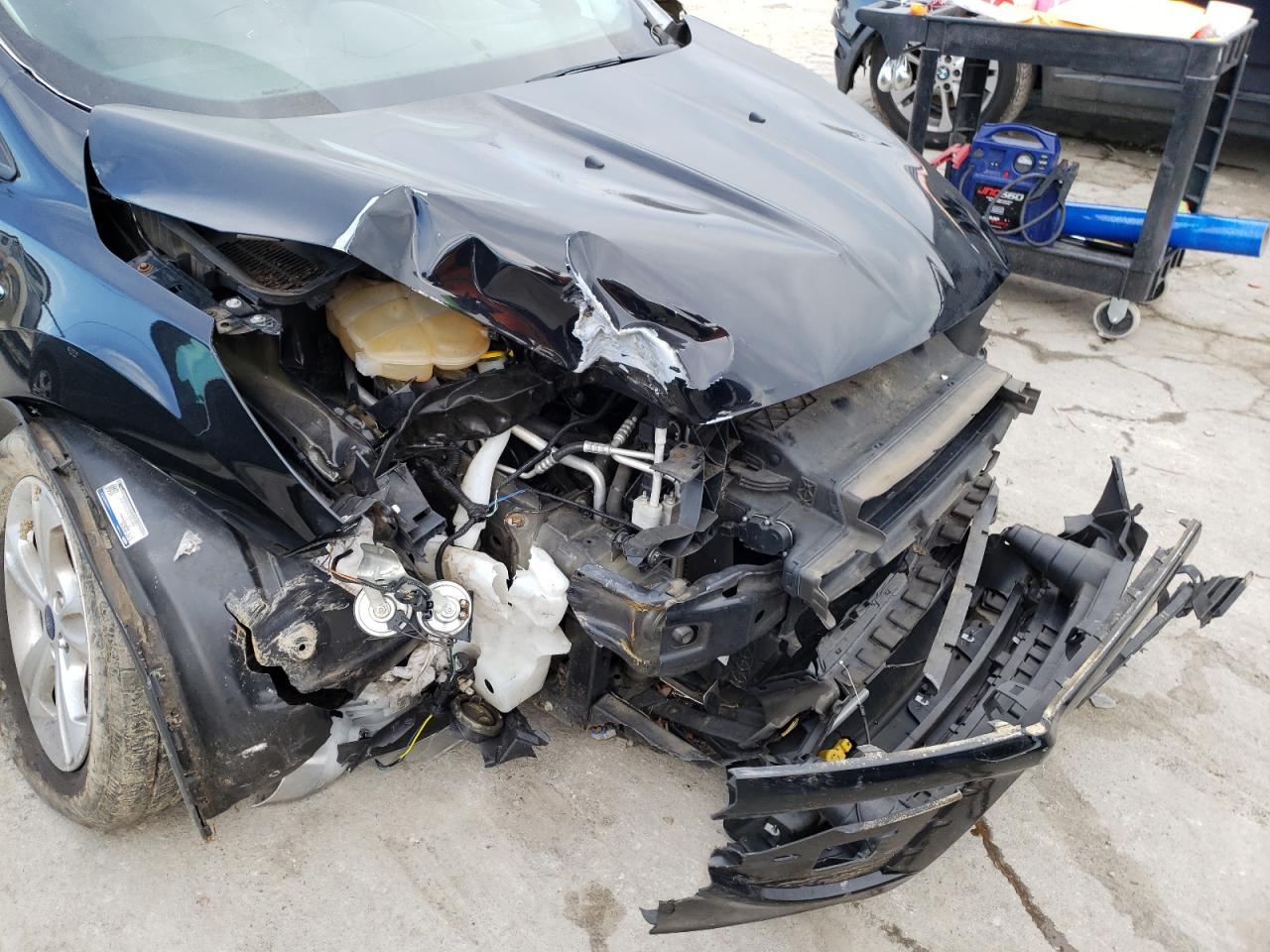 Photo 9 from auction – 2016 FORD ESCAPE SE with VIN 1FMCU0G78GUC29884