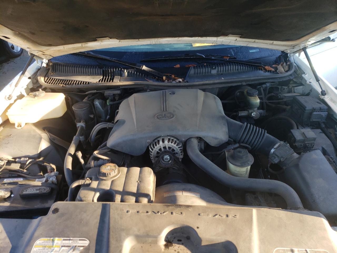 Photo 7 from auction – 1998 LINCOLN TOWN CAR E with VIN 1LNFM81W7WY662454