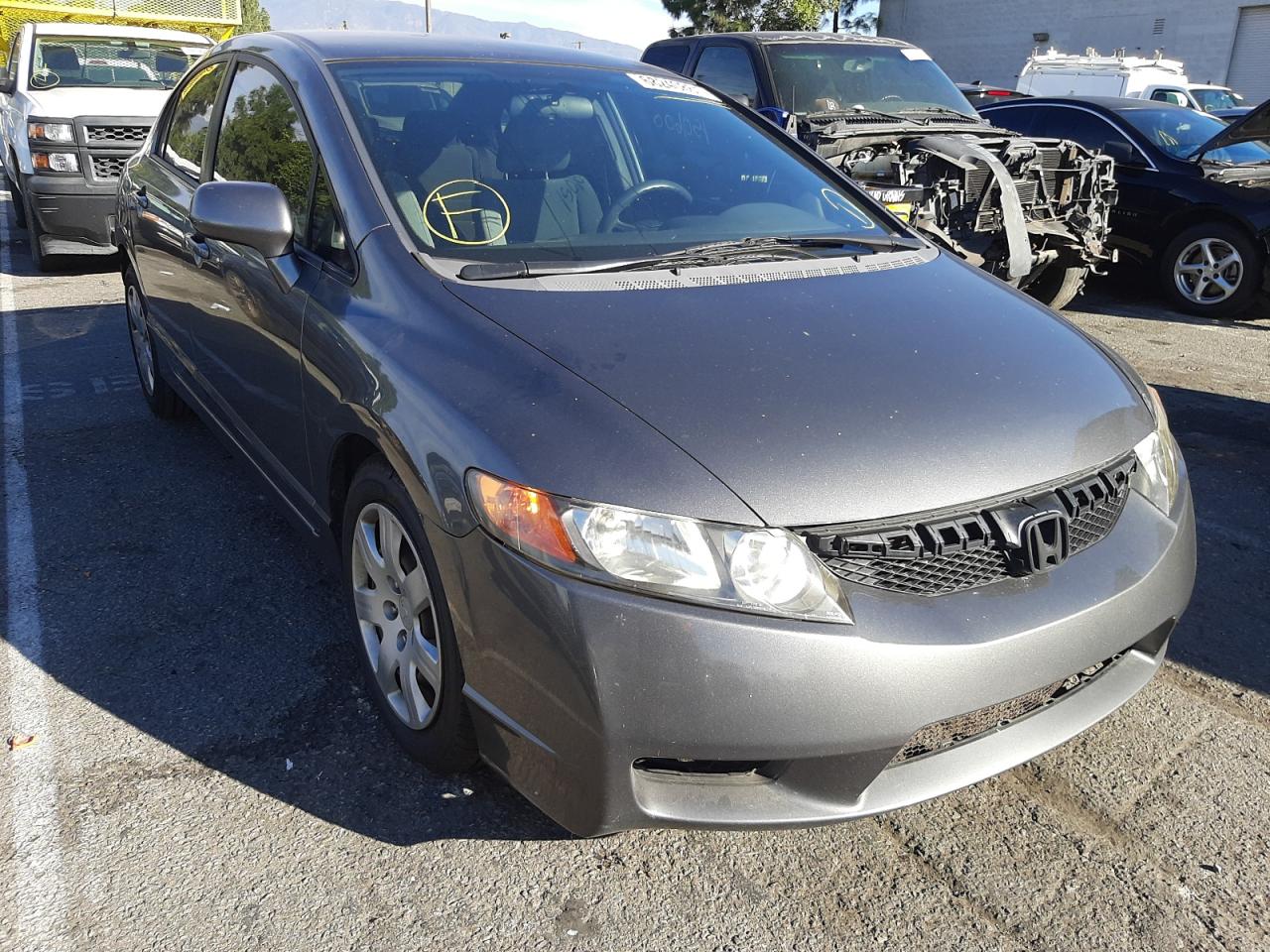 HONDA CIVIC LX 2009 with VIN 19XFA16519E025817 - Photo from auction