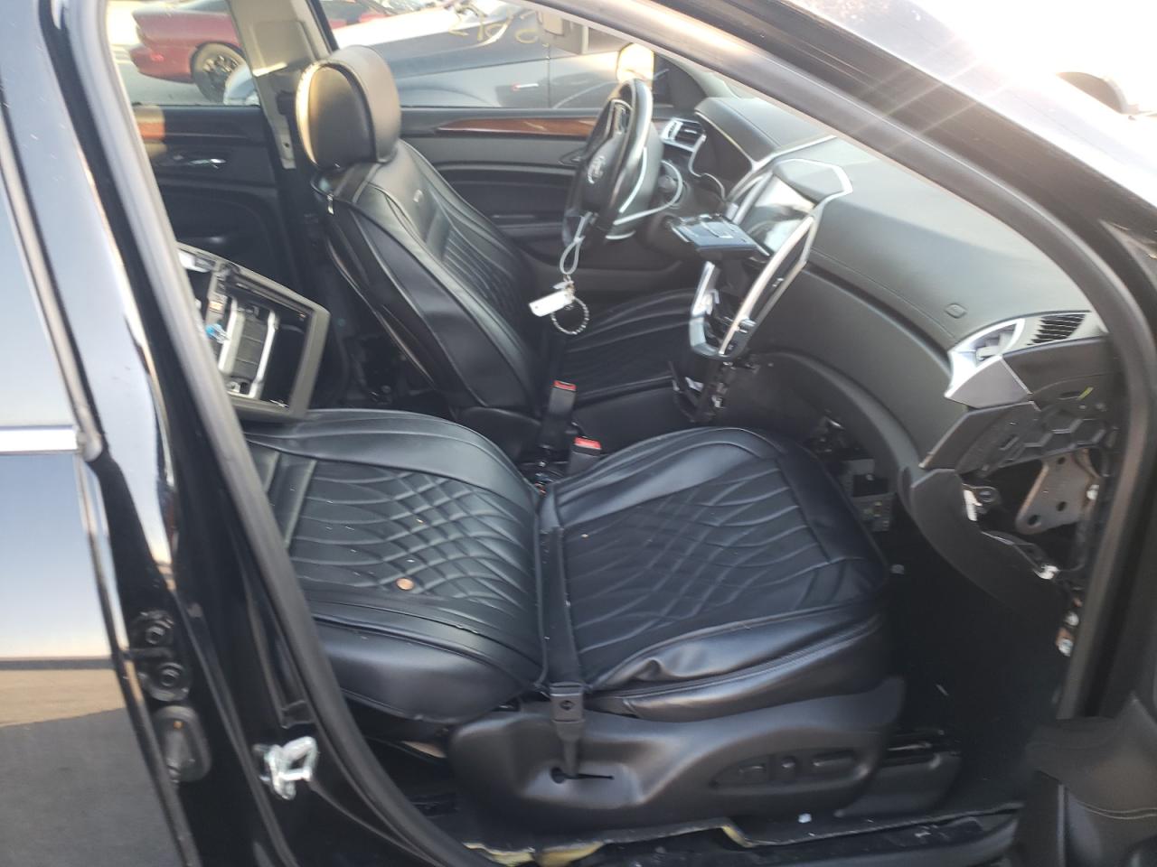 Photo 9 from auction – 2014 CADILLAC SRX PREMIU with VIN 3GYFNGE36ES574345