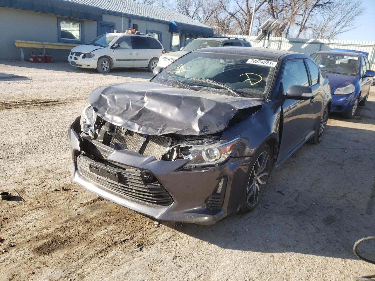Photo 2 from auction – 2016 TOYOTA SCION TC with VIN JTKJF5C77GJ020851