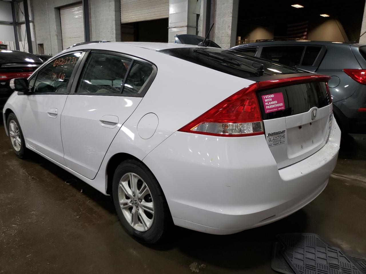 Photo 3 from auction – 2010 HONDA INSIGHT with VIN JHMZE2H77AS043342