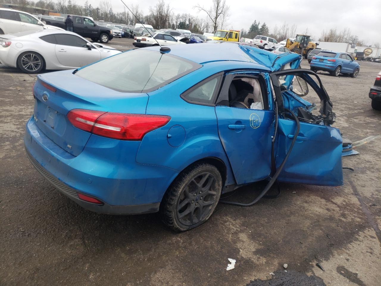 Photo 4 from auction – 2016 FORD FOCUS SE with VIN 1FADP3F21GL301799