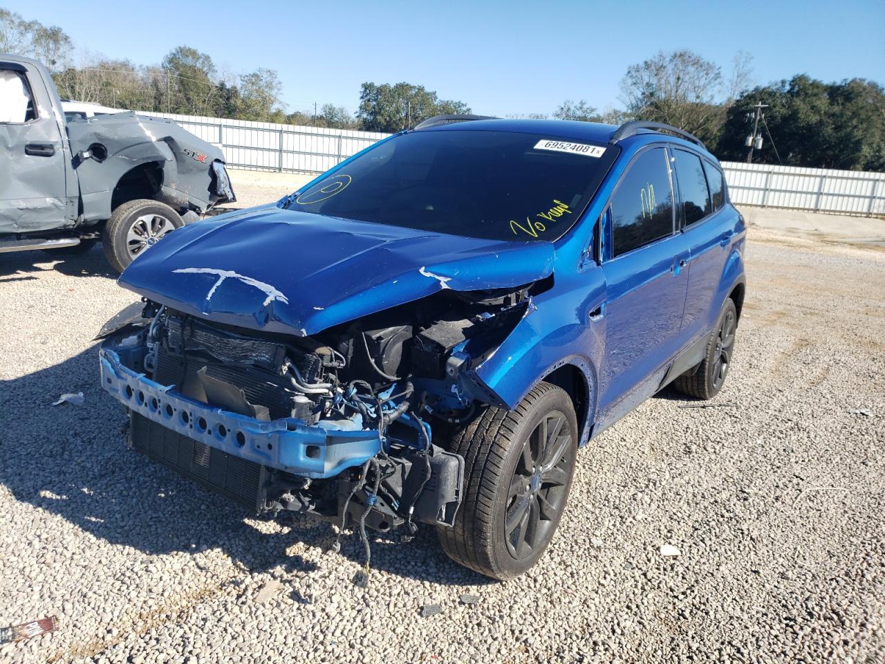 Photo 2 from auction – 2019 FORD ESCAPE SE with VIN 1FMCU9GD2KUA38996