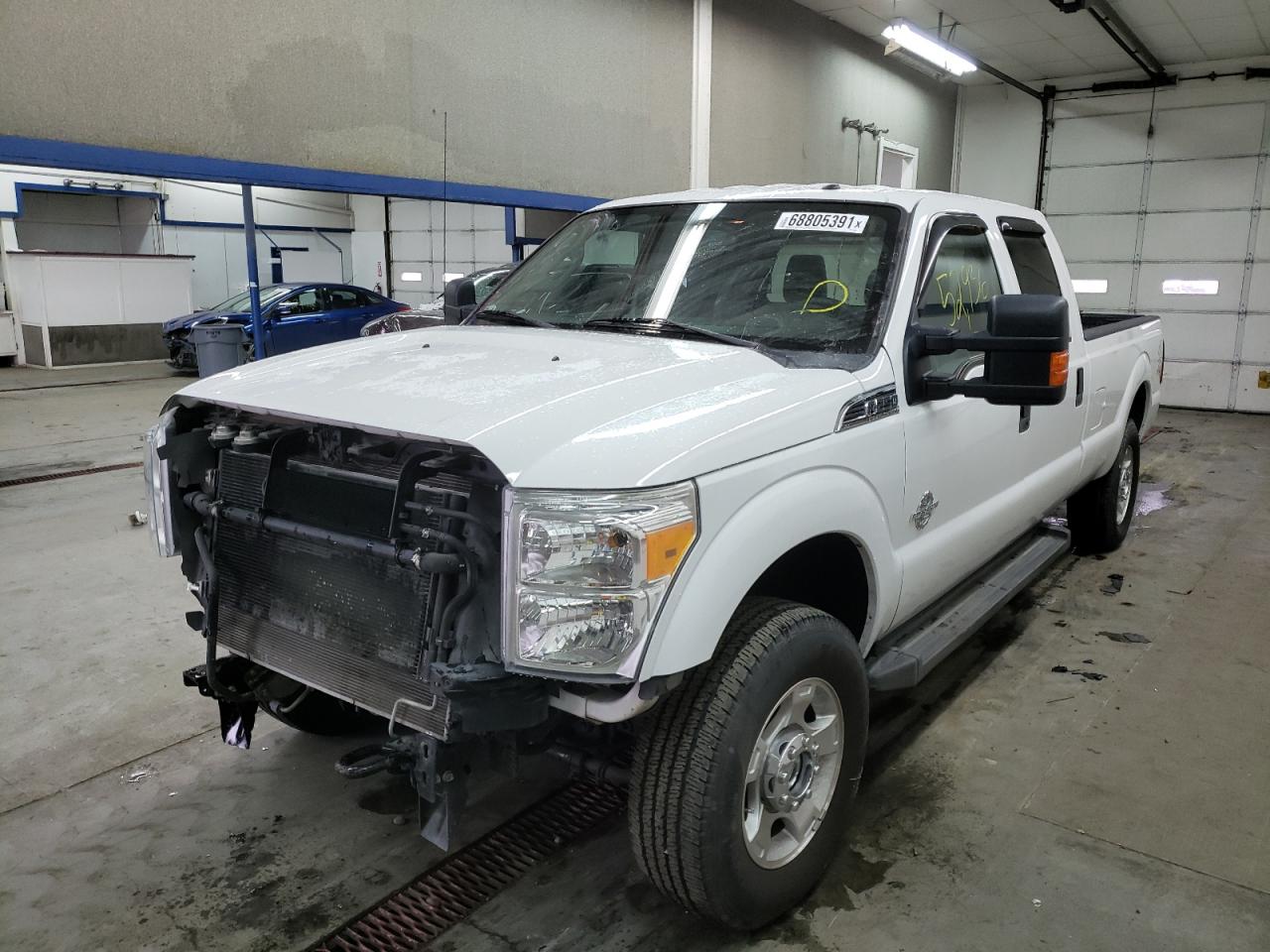 Photo 2 from auction – 2013 FORD F250 SUPER with VIN 1FT7W2BT5DEA20544